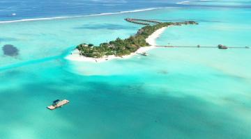 In the lower left corner of this photograph, researchers prepare a submersible device. “Together with our collaborators in the Maldives, we are designing, testing, building, and deploying submersible devices that, based simply on their geometry i...