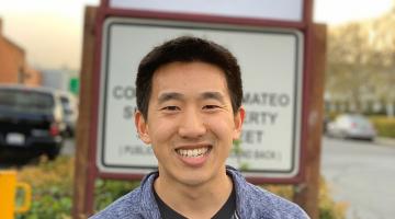 Joel Jean PhD ’17, co-founder of Swift Solar, stands in front of the company’s sign at its permanent location in San Carlos, California.Photo courtesy of Joel Jean.