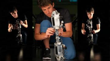 Matt Carney, together with a team of researchers from the Media Lab's Biomechatronics group, designed and built the robotic prothesis featured in the new U.S. postage stamp.Photo: Andy Ryan